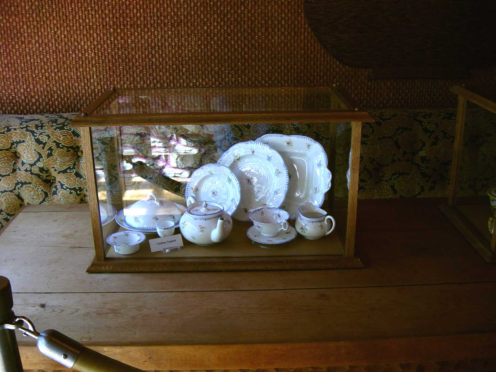 Display of English china in dining room
