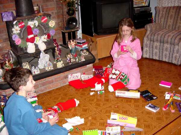 Geoffrey and Erin opening their stockings