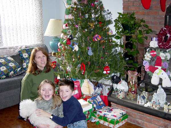 Christine, Geoffrey, Erin and Special under the Christmas tree
